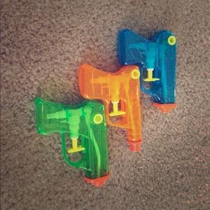 A set of three water guns