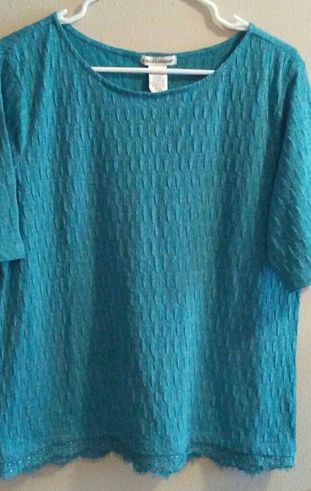 Cute turquoise top with a lace bottom