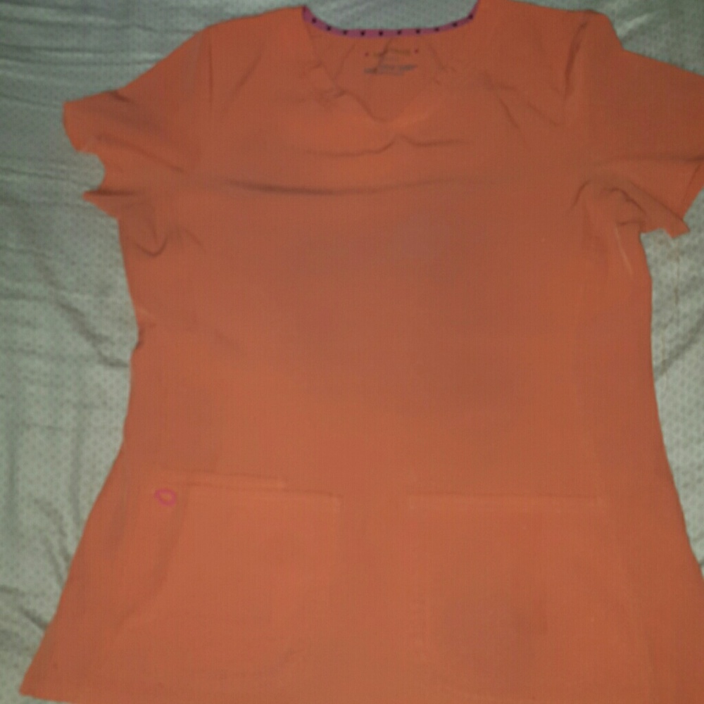 I'm selling a heartsoul scrub top.