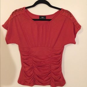 Rust orange top with crochet sleeve detail
