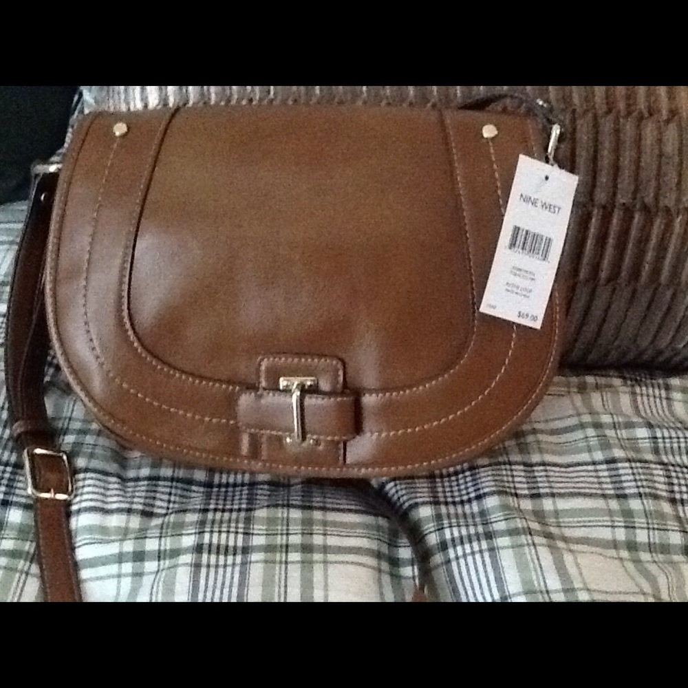 Make me an offer. Nine West Saddle bag. New