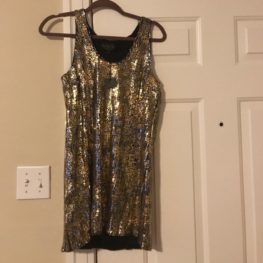 Gold sequined tunic top that's about 30" long