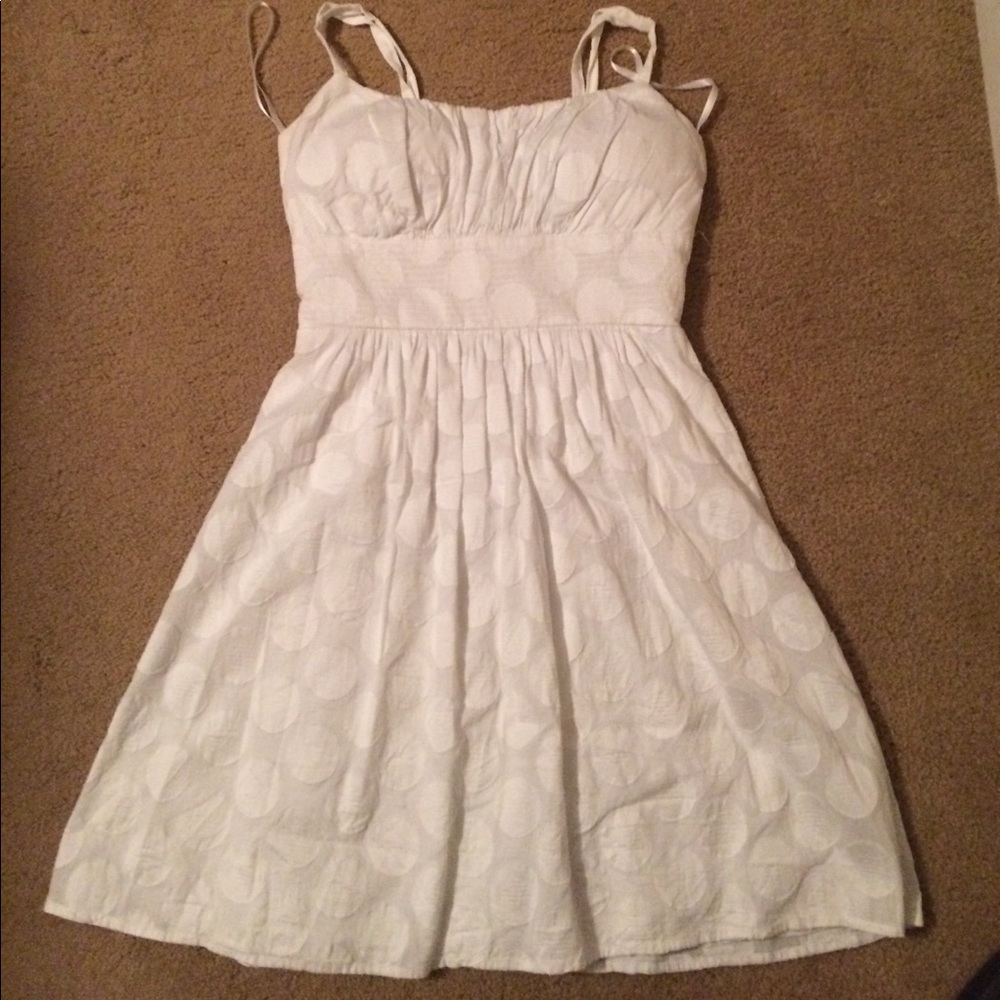 White on white polkadot dress
