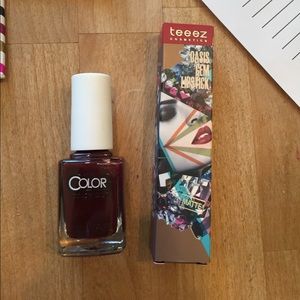 Oasis gem lipstick and color club nail polish.