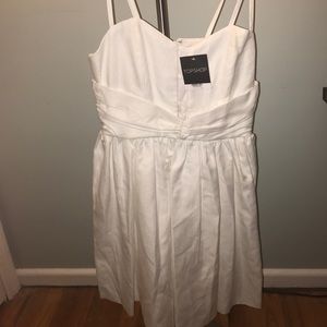 Super cute white dress with cutouts