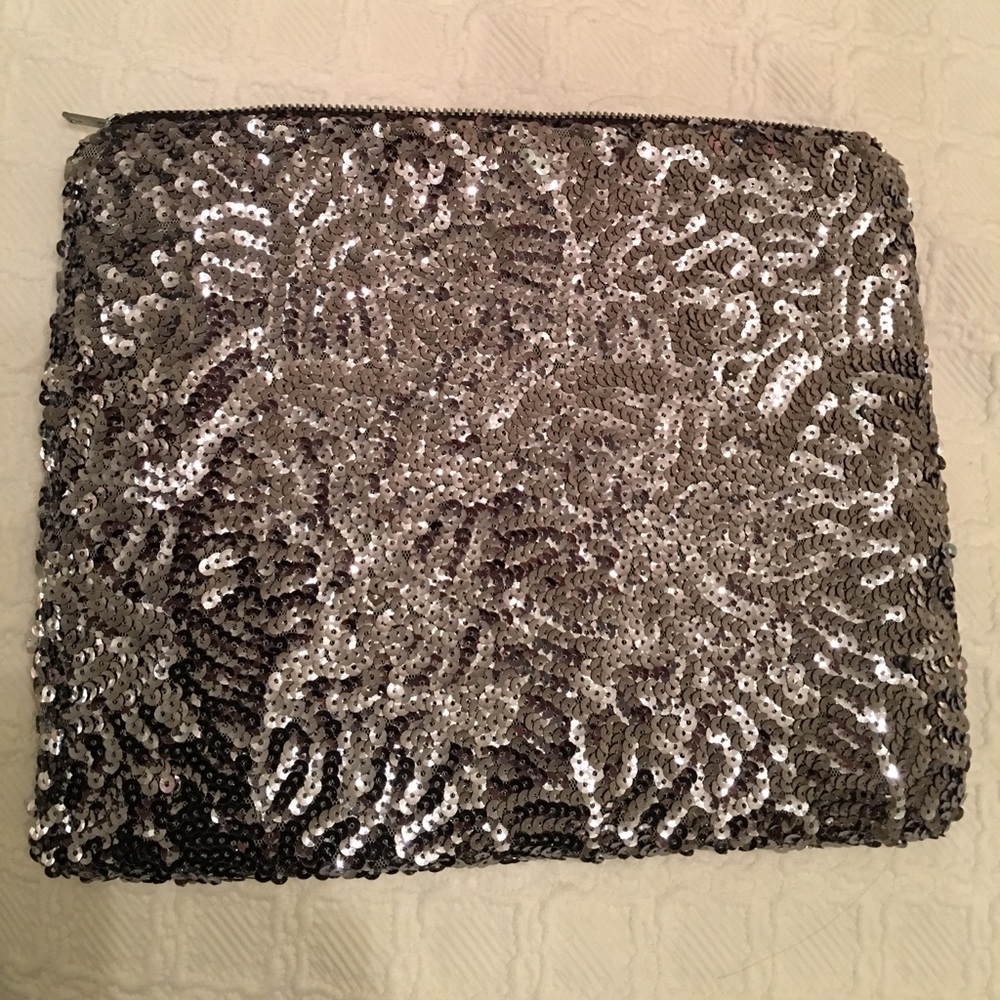 Dark gray sequin envelope clutch, zipper closure.