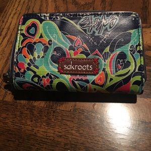 Sakroots wallet peacock design.