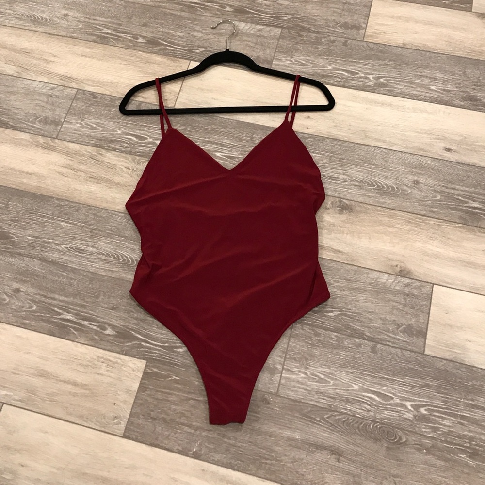 Deep red low back thong bodysuit