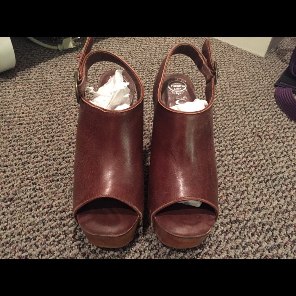 Jeffrey Campbell brown leather platform sandals.