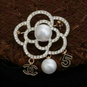 CHANEL PEARL BROOCH