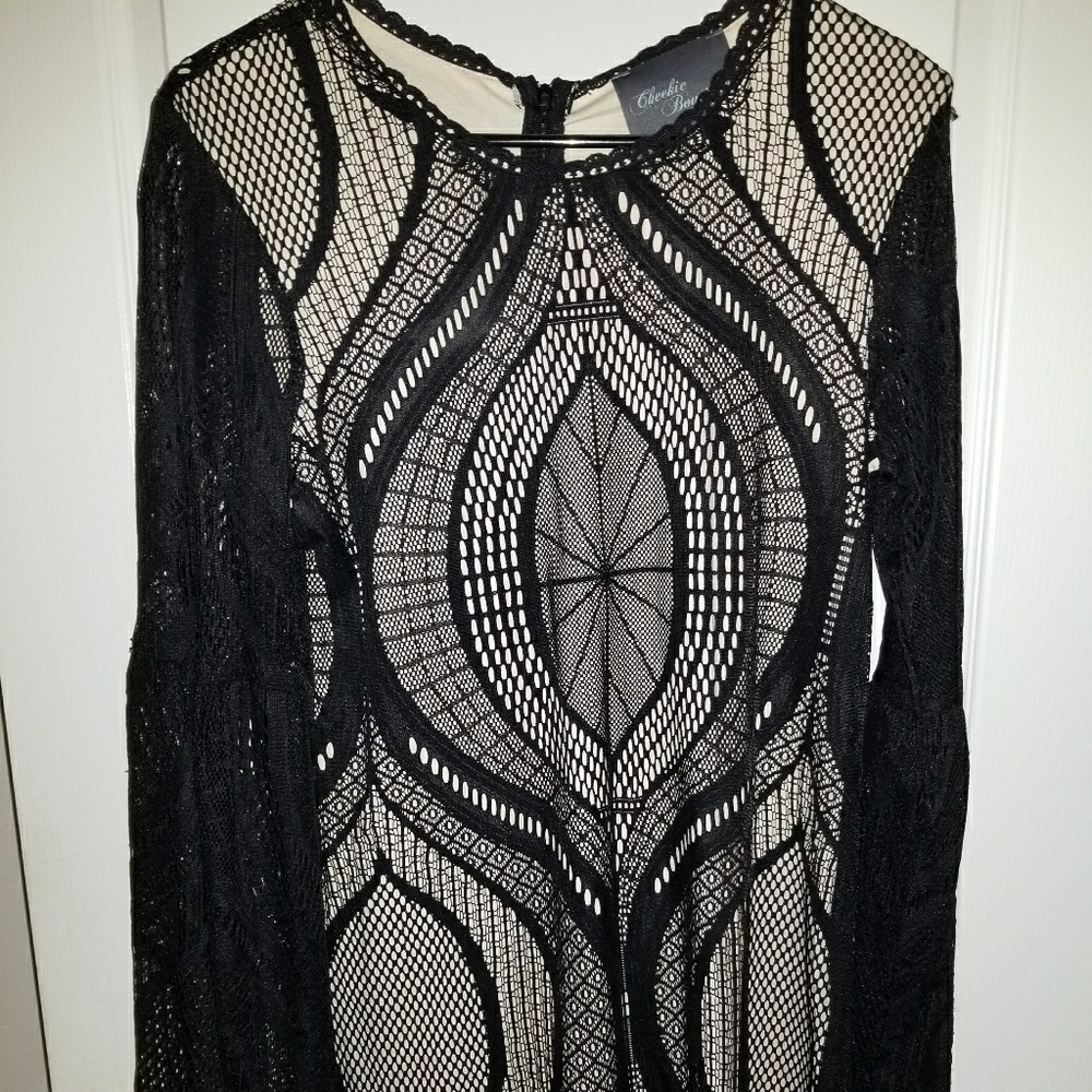 Black and nude bell long sleeve dress
