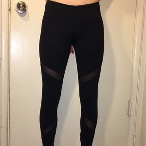 Black leggings with mesh strips