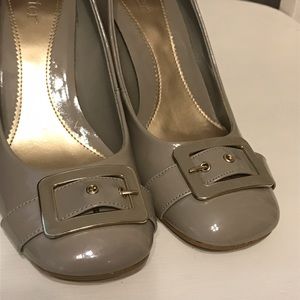 Greige Dexter patent leather pumps