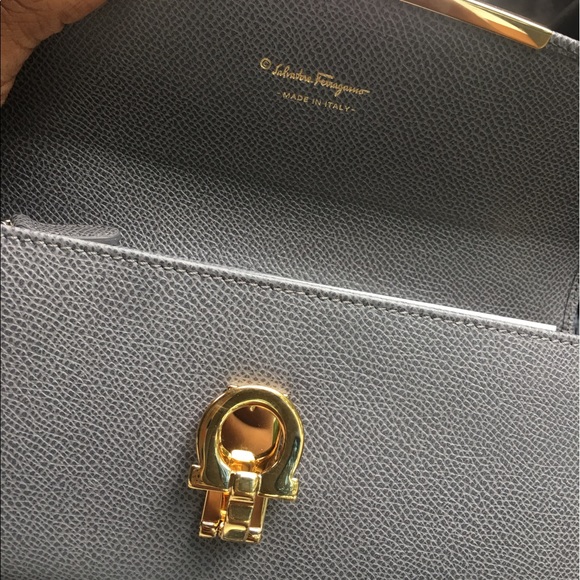 Tan Ferragamo belt 150 Grey Ferragamo Wallet 300