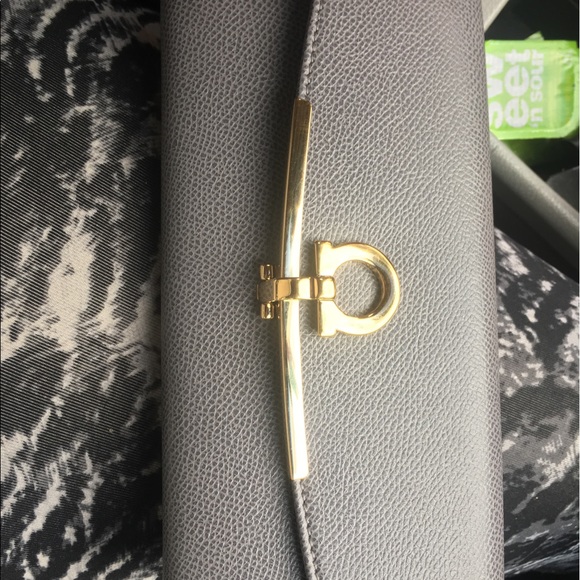 Tan Ferragamo belt 150 Grey Ferragamo Wallet 300