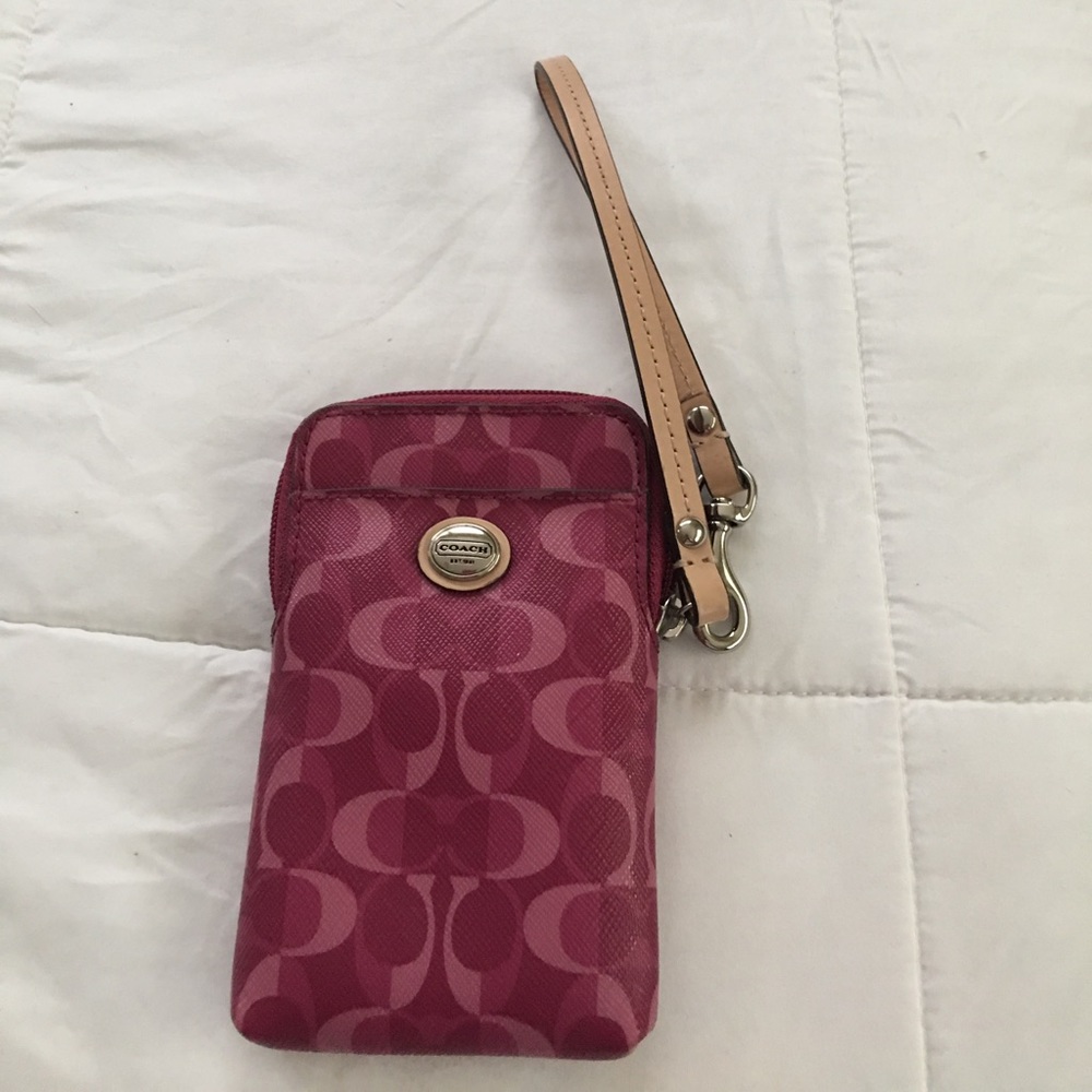 Authentic Coach wallet / cell phone holder.
