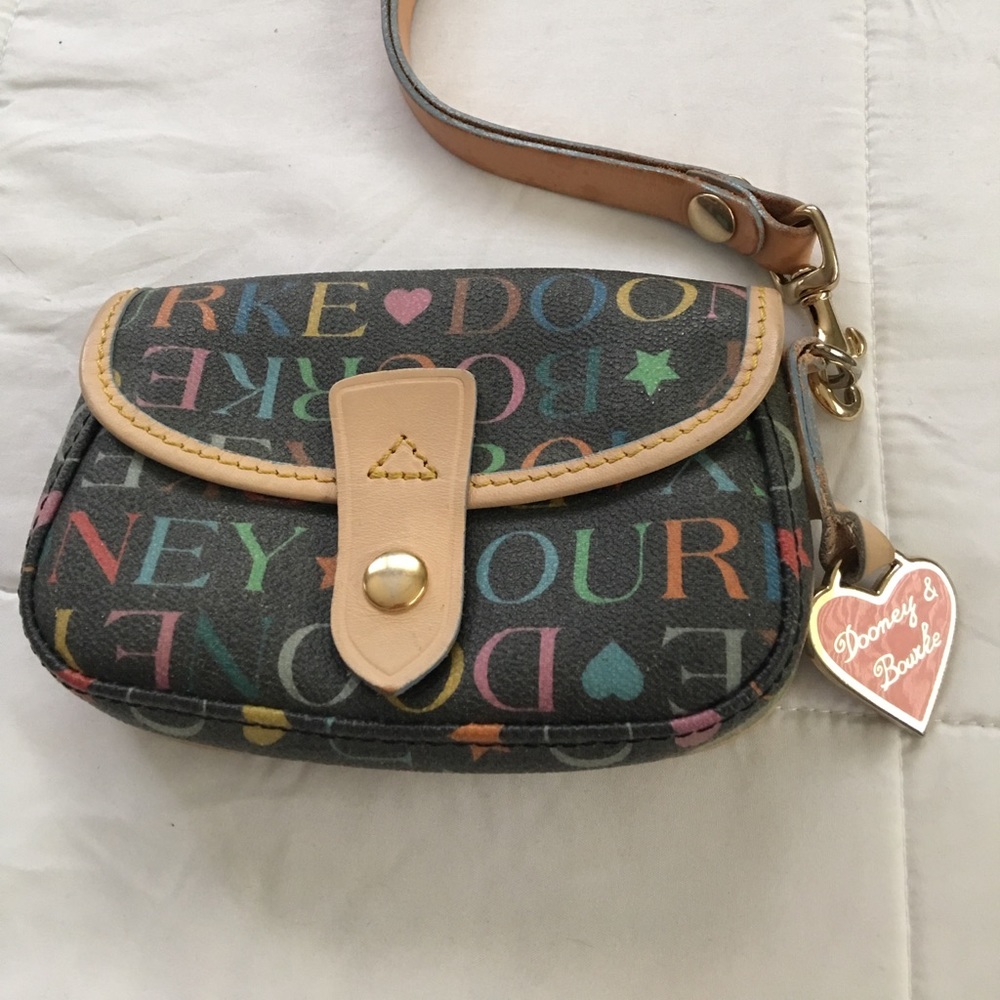 Authentic Dooney & Bourke leather wristlet.