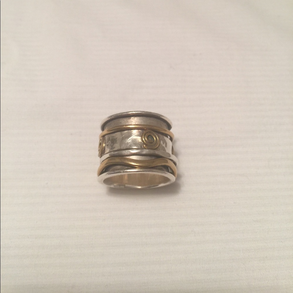 Sterling silver and brass spinner ring.
