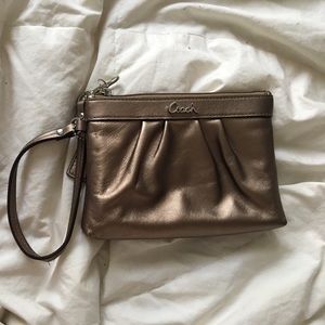 New Bronze Coach Wristlet