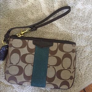 Tan Coach wristlet