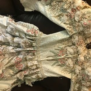 Haute couture wedding dress. Needs dry cleaning.