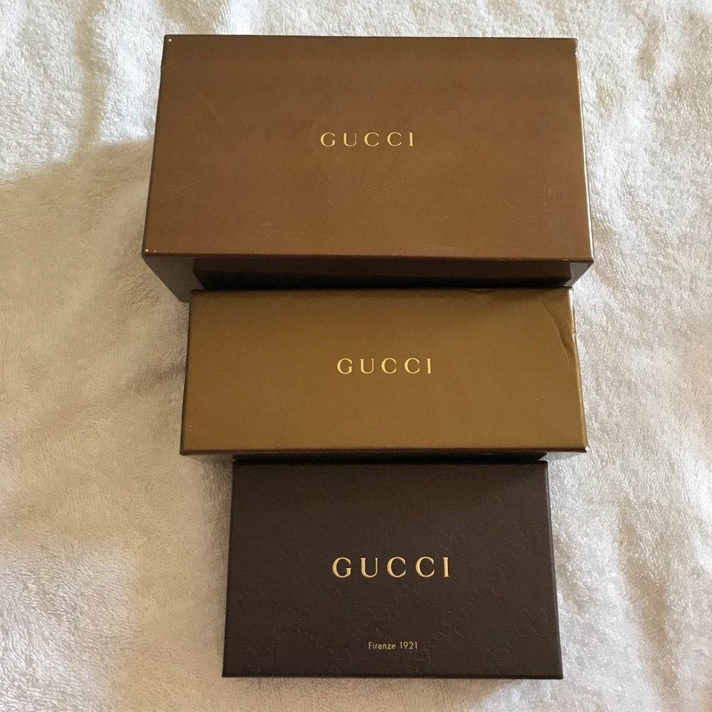 3 Gucci boxes