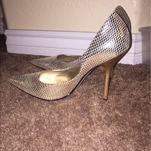 Gold high heel pumps by "Guess