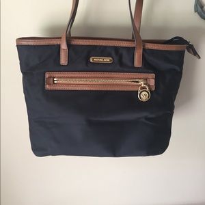 Black Michael Kors tote bag.