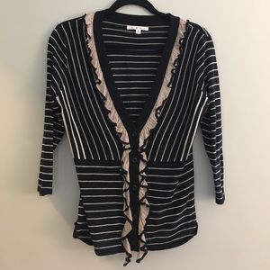 CAbi style 276 ruffled v-neck.