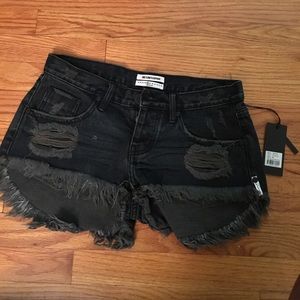 Black ripped shorts