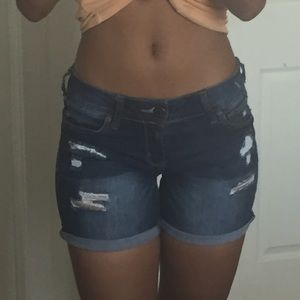 dark wash distressed ripped jean shorts