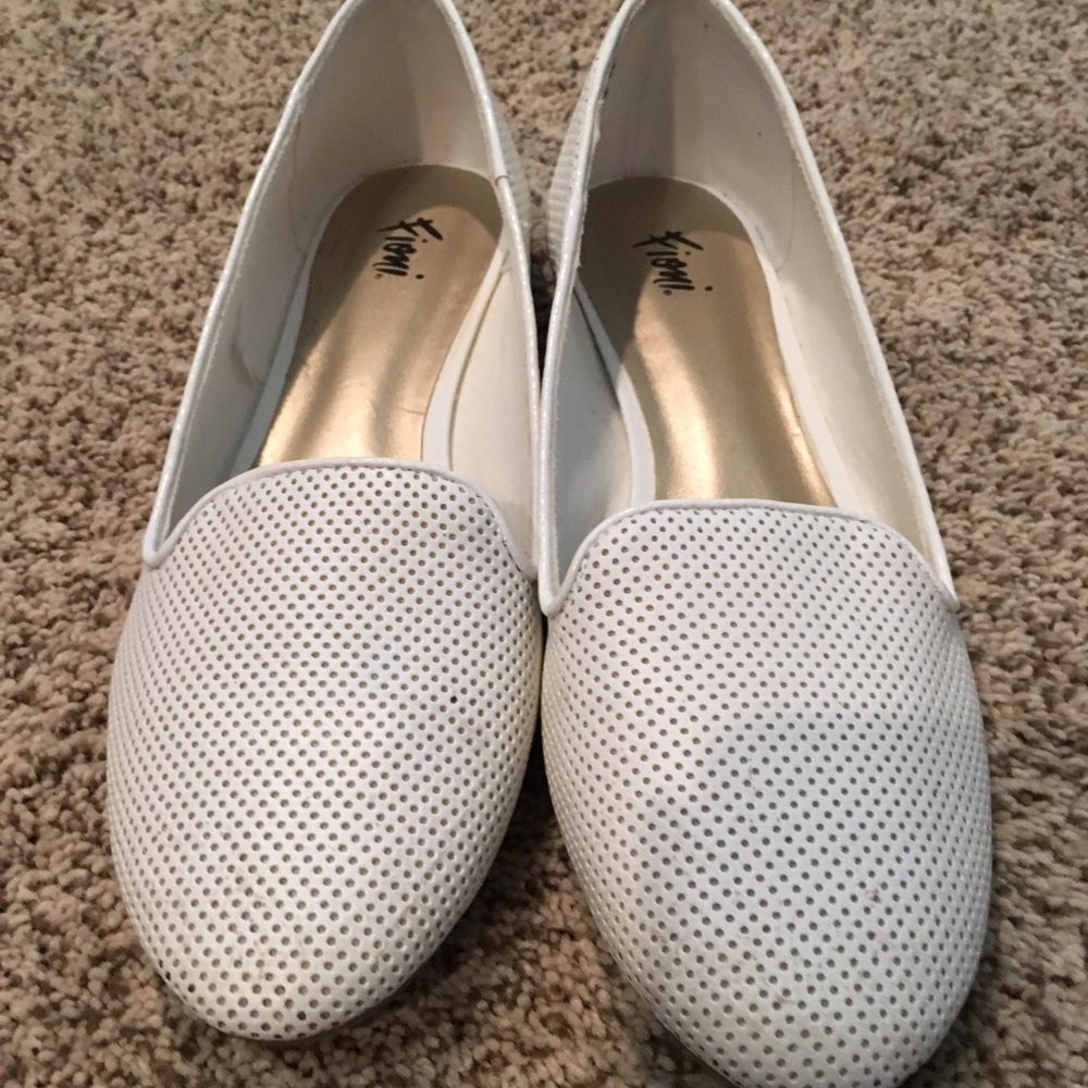 White flats with small heel