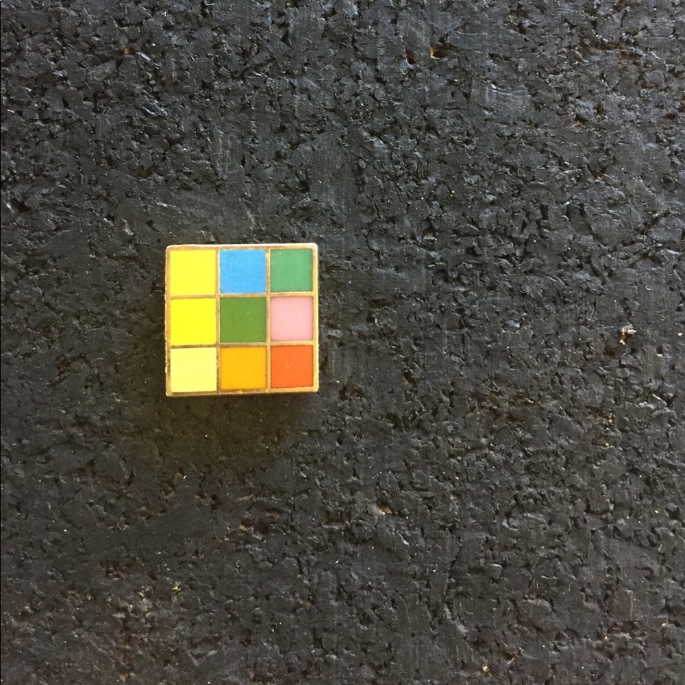 Vintage rubics cube lapel pin.