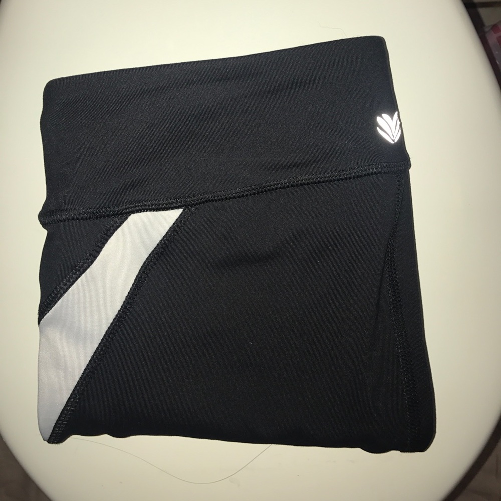 f21 black leggings w a white streak on the side