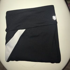 f21 black leggings w a white streak on the side