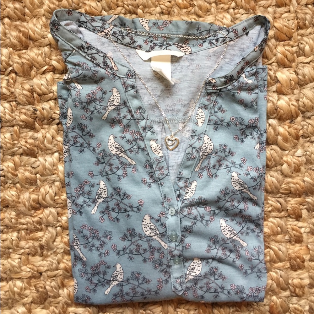 H&M shirt with bird and flower print.