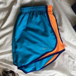 Blue/orange Nike athletic shorts