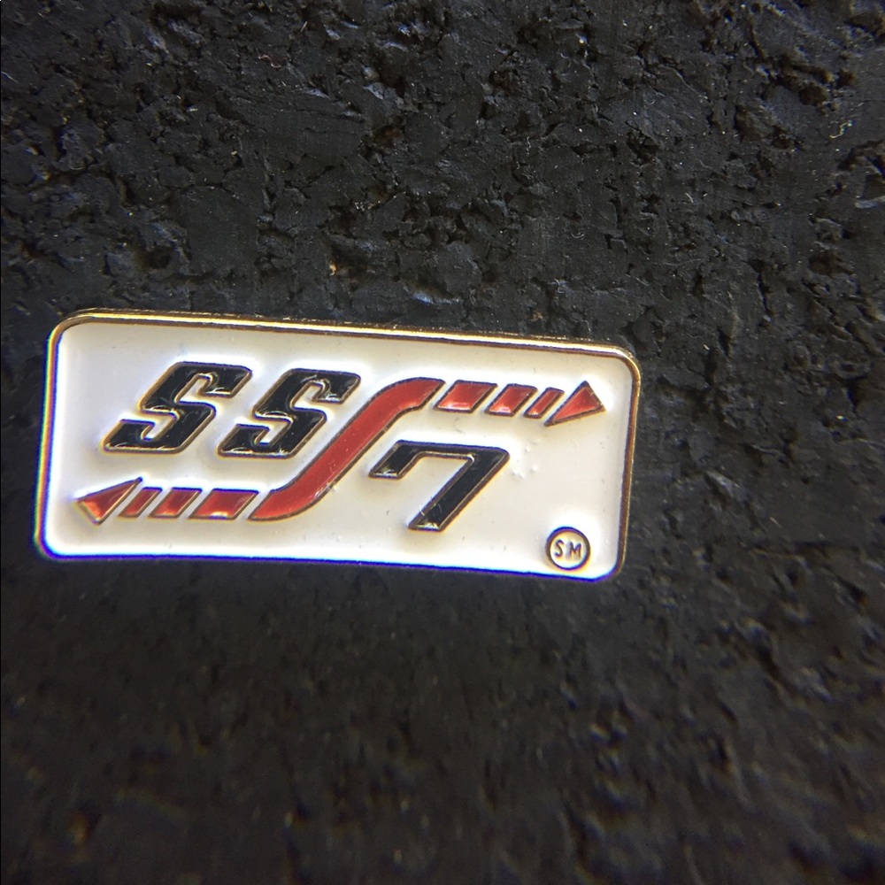 Vintage race team lapel pin