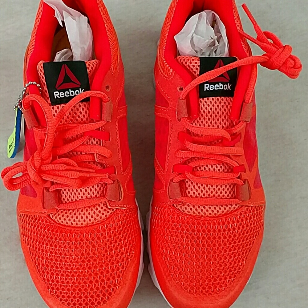 Reebok bright orange sneakers