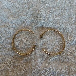Chloe and Isabel gold hoop earrings.
