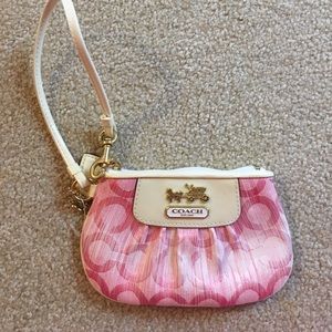 Small light pink coach wristlet