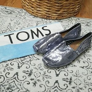 Toms sneakers. Never worn.
