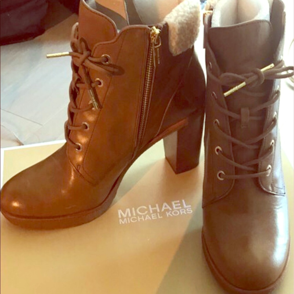 Brand new caramel colored lace up MK bootie