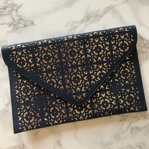 Navy blue and gold perforated envelope clutch