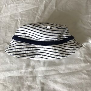 Navy blue and white striped infant hat