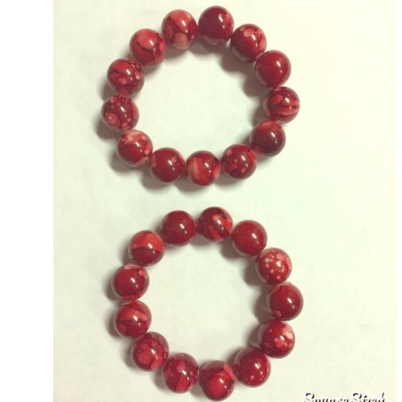 Jewelry - Pair of red beaded bracelets