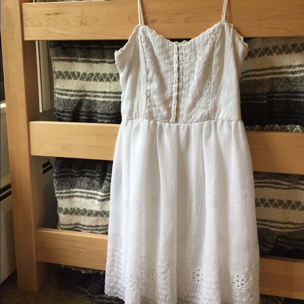 White dress with bow belt