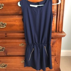 Navy romper with gold zippers