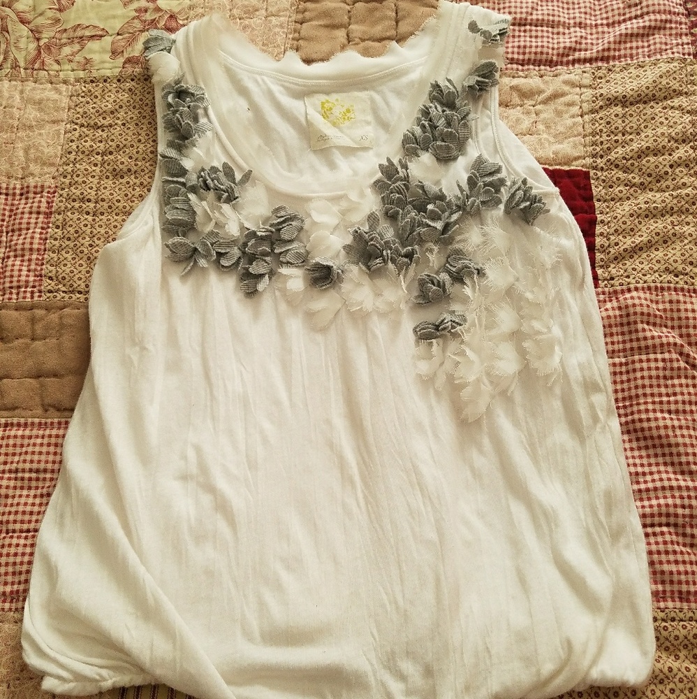 White, grey flower blouse.