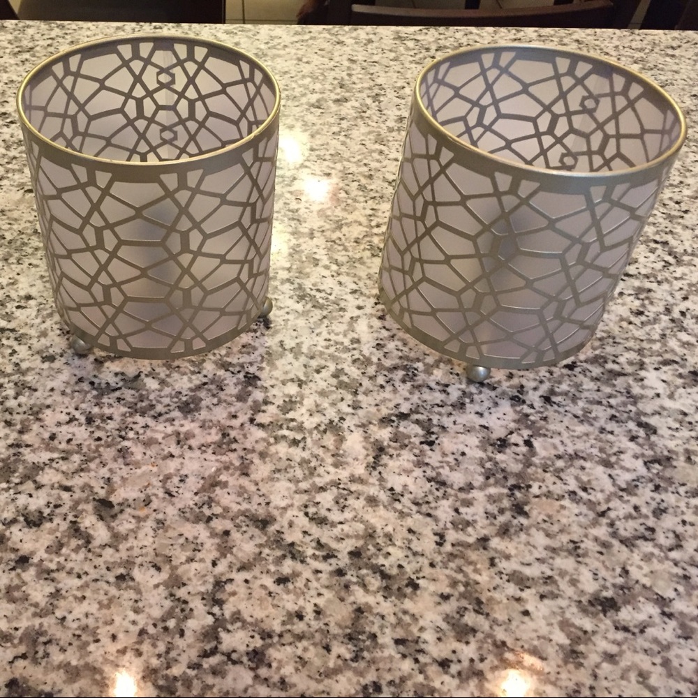 Pair of bedside lamps/lights or mood lighting.